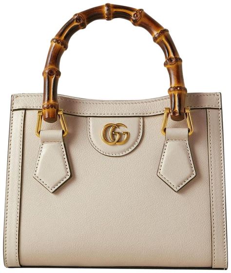 gucci hue dame|white Gucci handbag.